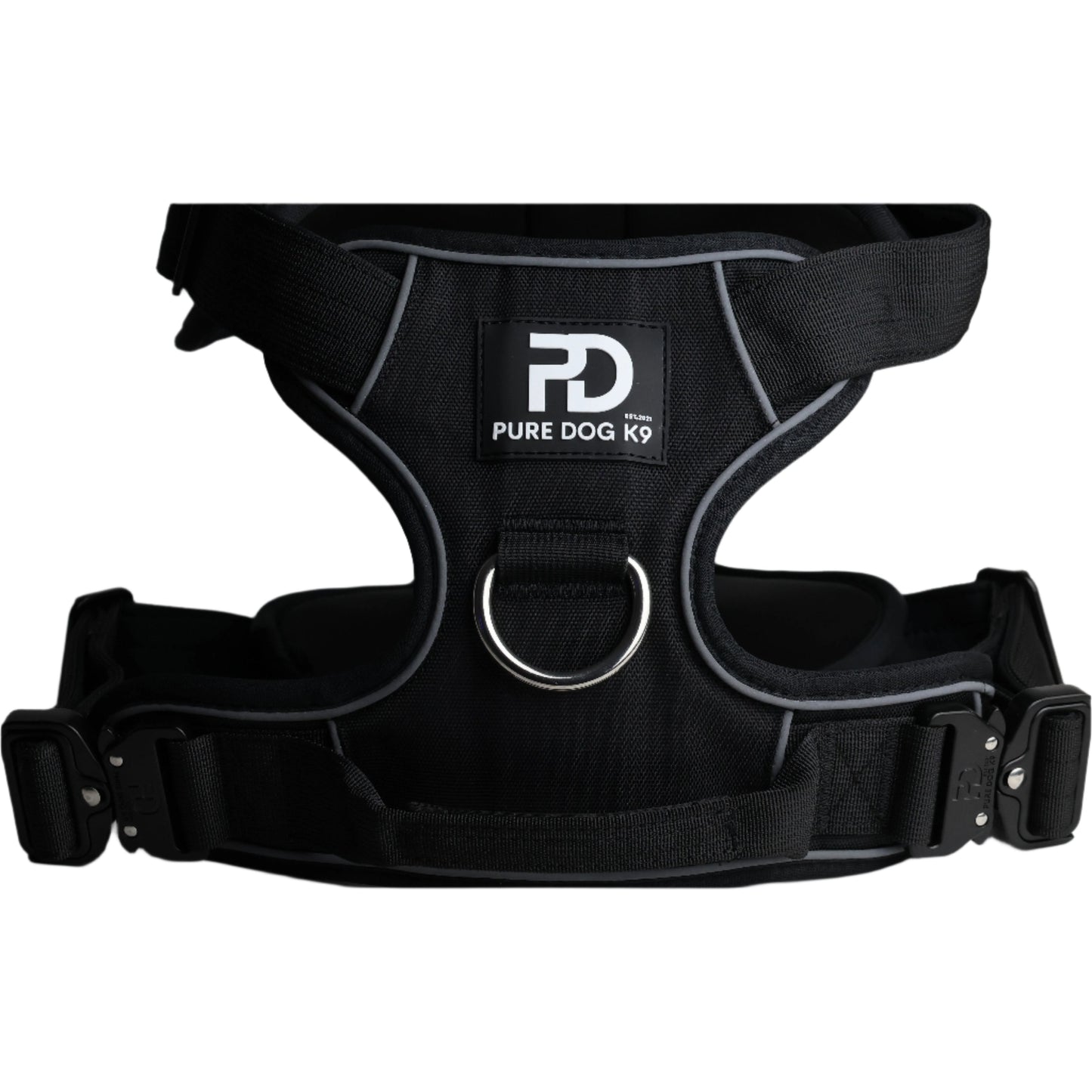 Black comfort dog harness by Pure Dog K9 with a metal ring and reflective trim.